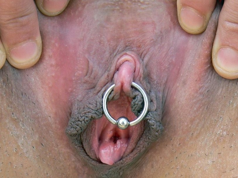 Clit's head piercing
