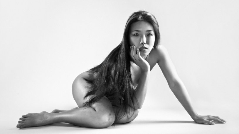 Asian girls in a lotus pose photo in the style of nude