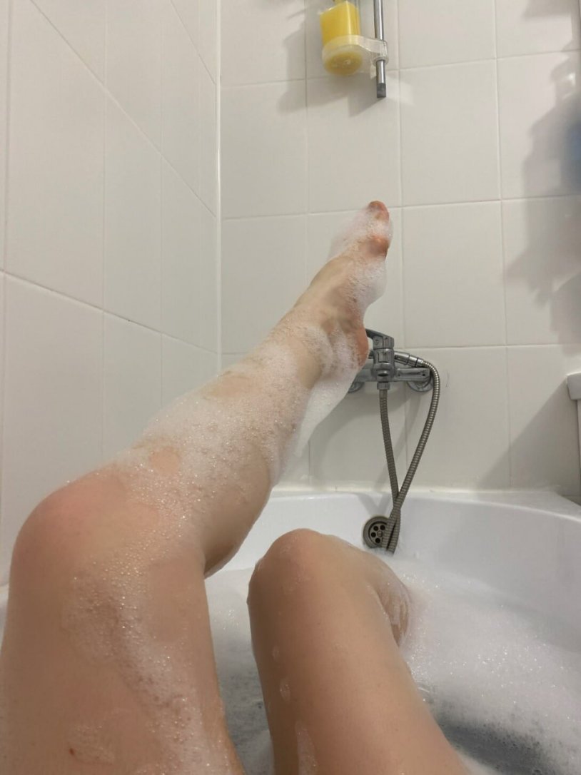 Female legs in the bathroom