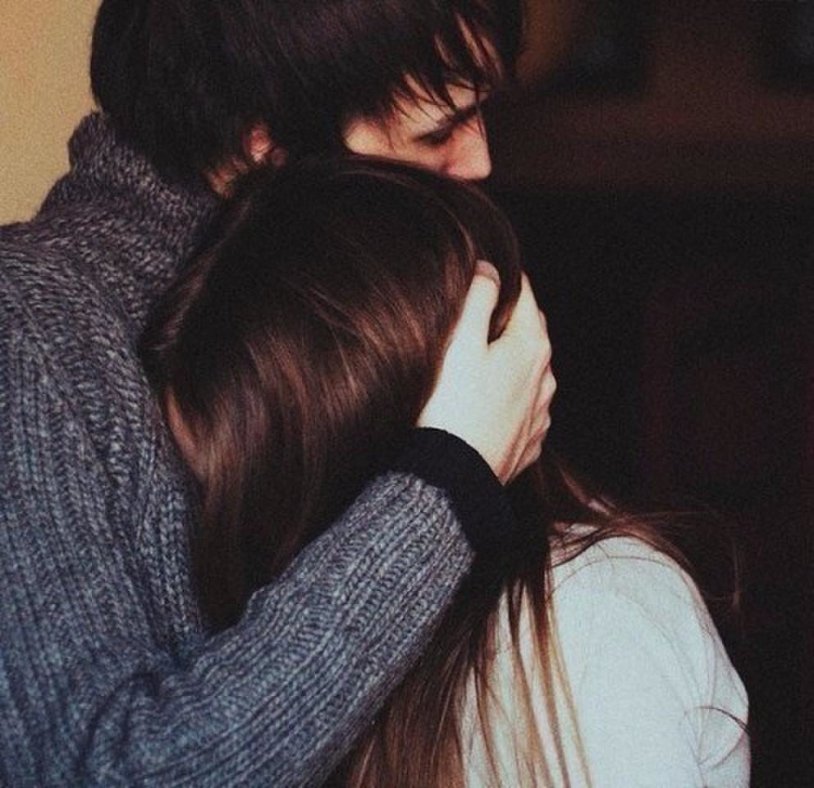 Boy and girl hug without face