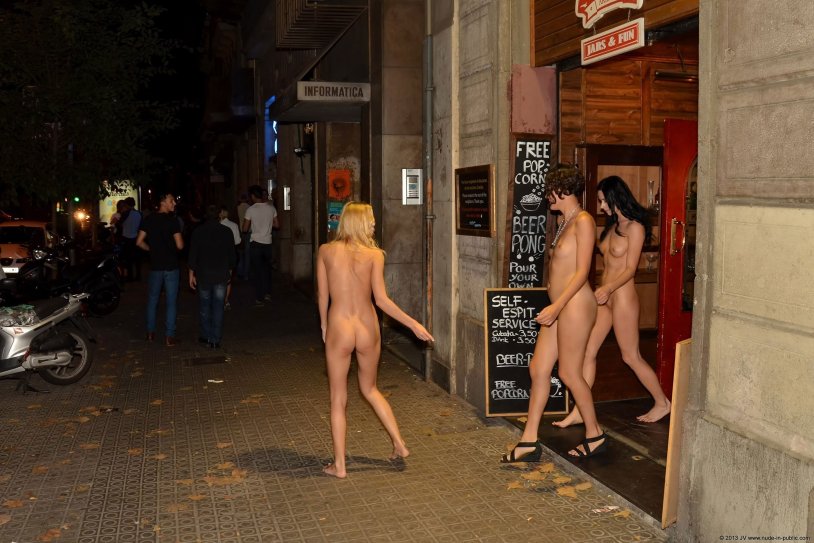 Woman undresses on the street