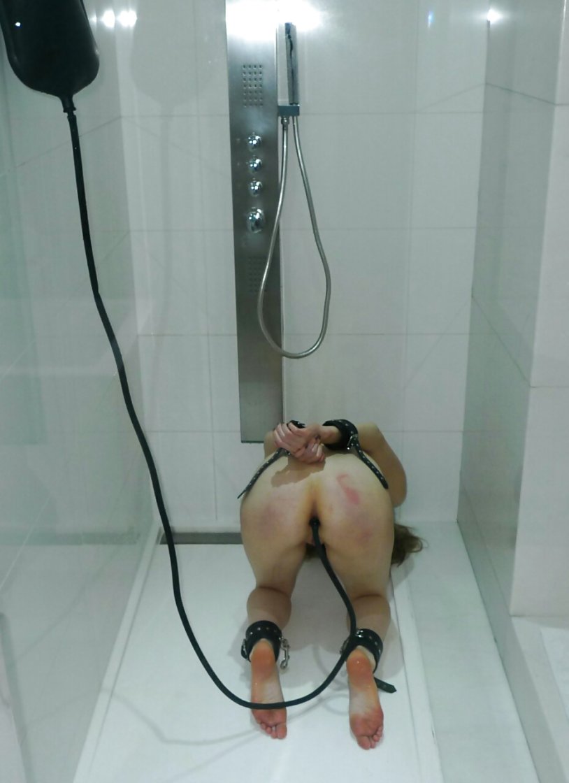 Erotic torture by an enema