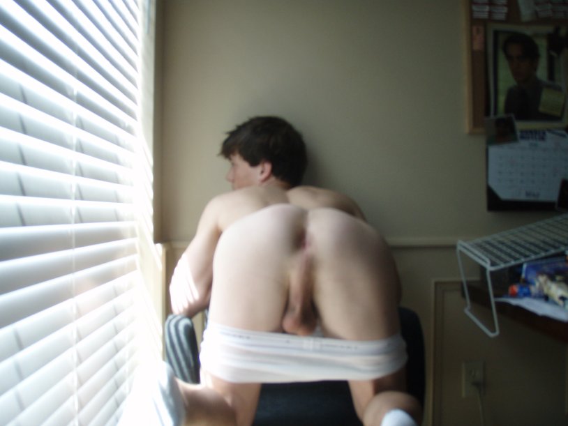 A Little Boy with A Bare Ass Lying on a Blanket