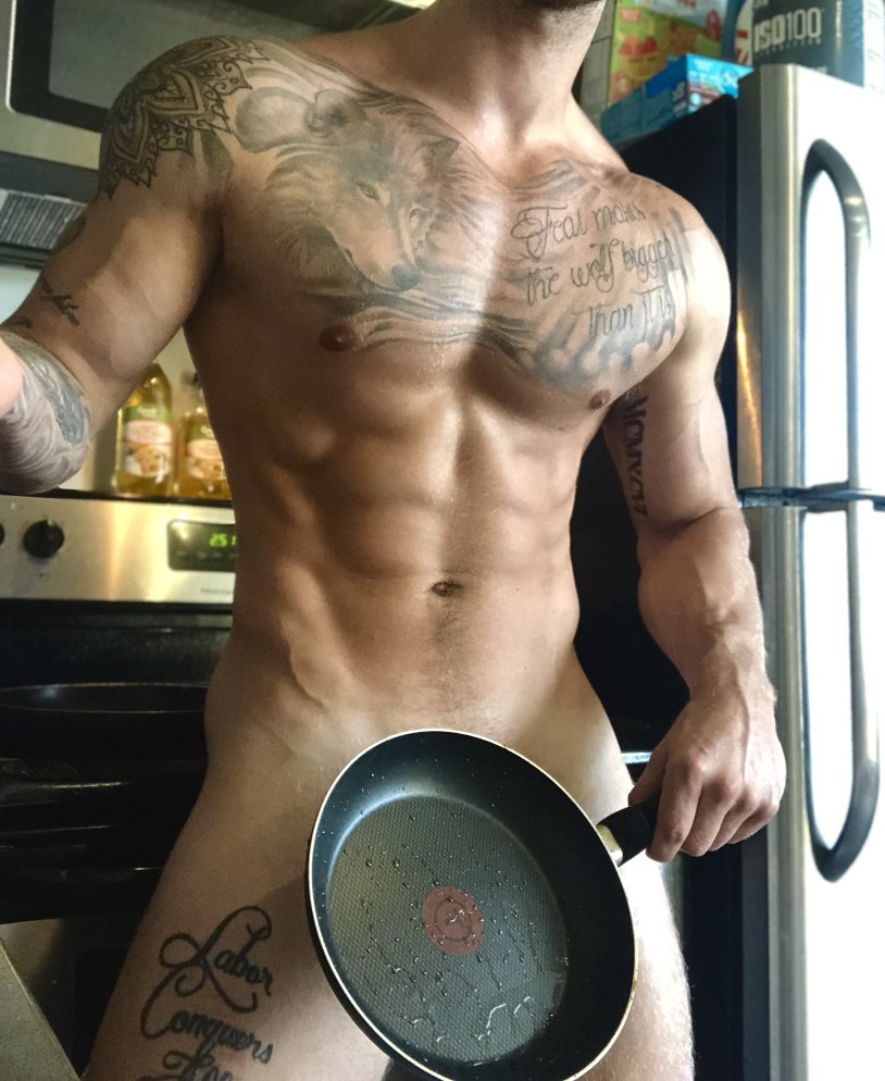 A man cooks in the kitchen