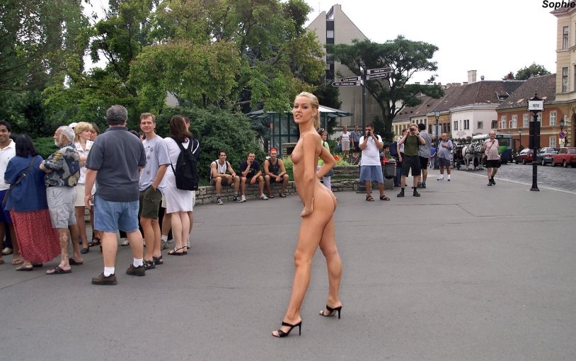 The girl undressed in the city center