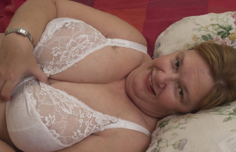 Elderly women in shorts and bra