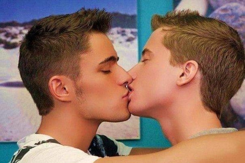 A kiss of young guys