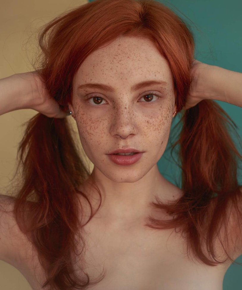 Red girls with freckles on the body