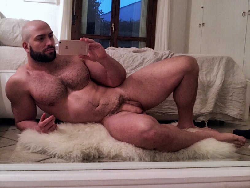 A bearded man with a huge member