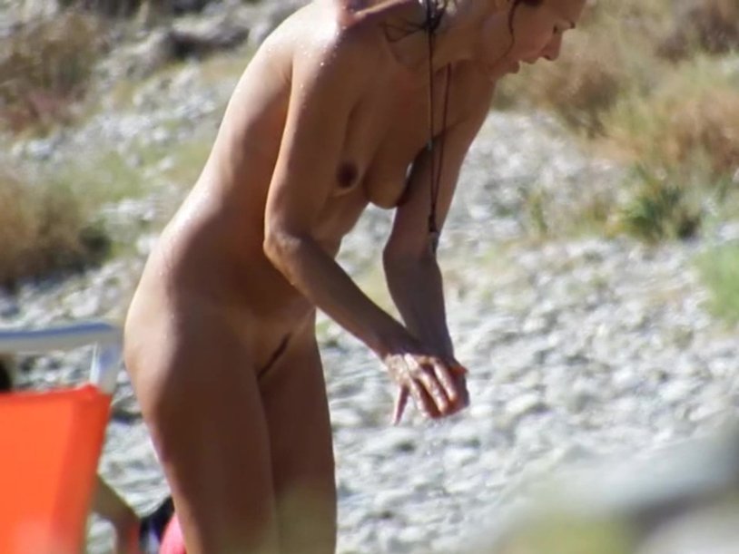 On the beach topless