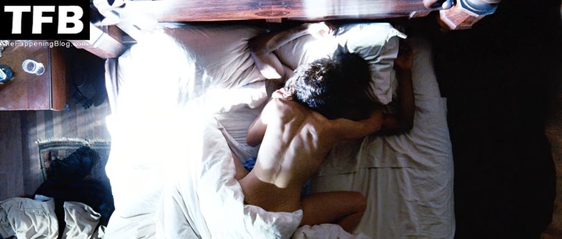 Woman and man in bed