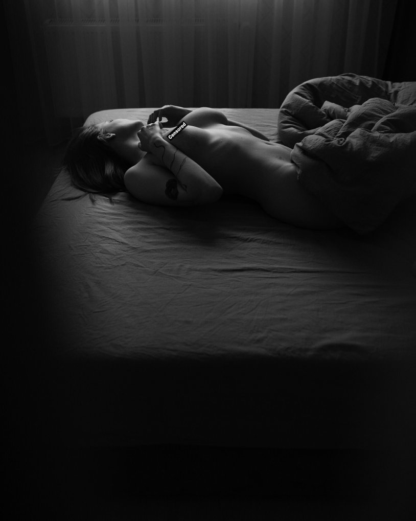 Brunette girl in bed