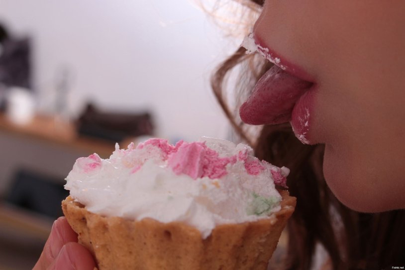 The girl eats ice cream