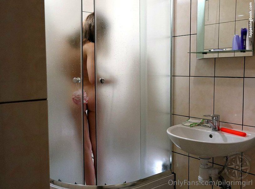 Naked wife poses in the shower