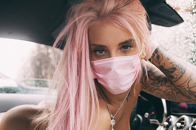 Blonde in pink mask