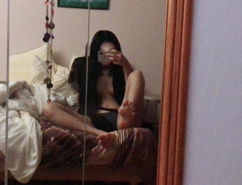 Girls in front of the mirror