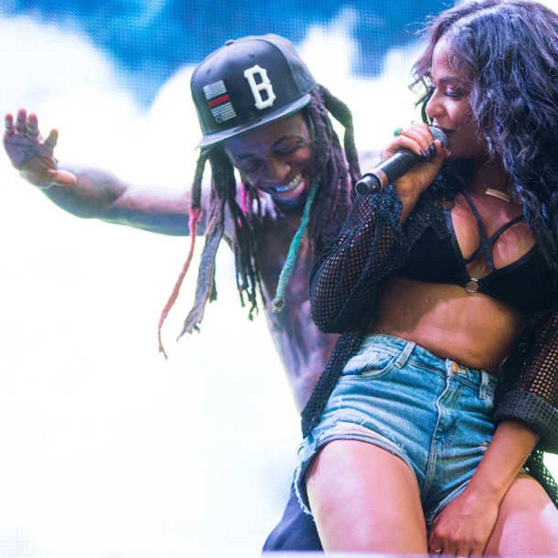 Lil Wein with a girl