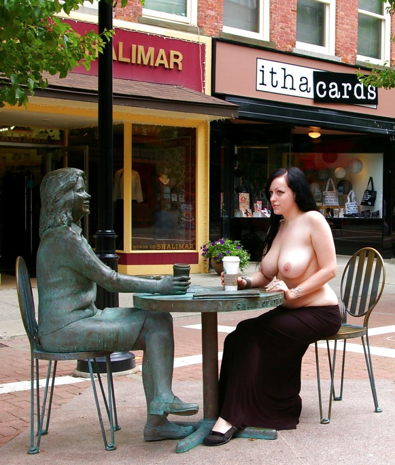 Naked women in a summer cafe