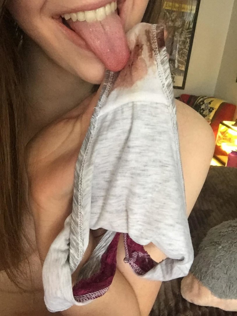 Girl with panties in her mouth