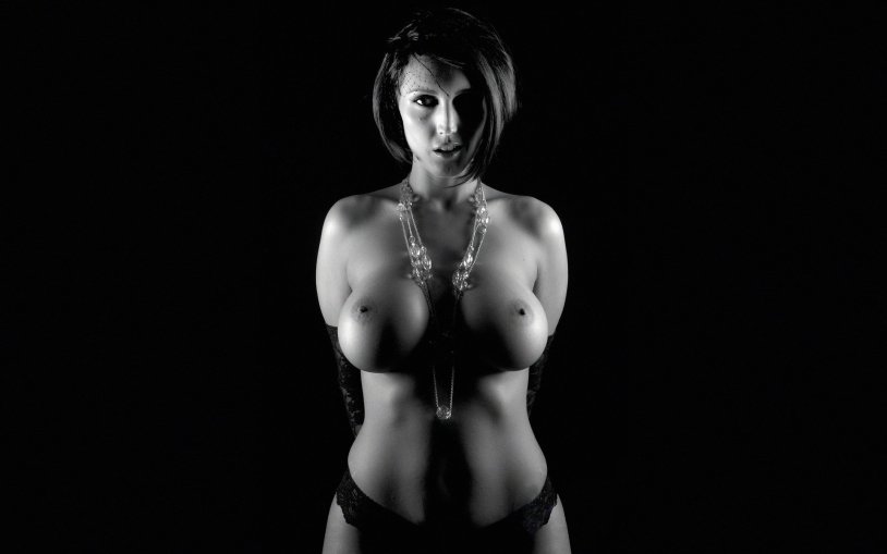 Girls with big tits on a black background